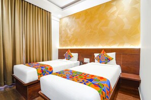 Egyptian cotton sheets, premium bedding, in-room safe, soundproofing - FabHotel Ellegant Inn (Bengaluru)