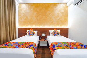 Egyptian cotton sheets, premium bedding, in-room safe, soundproofing - FabHotel Ellegant Inn (Bengaluru)