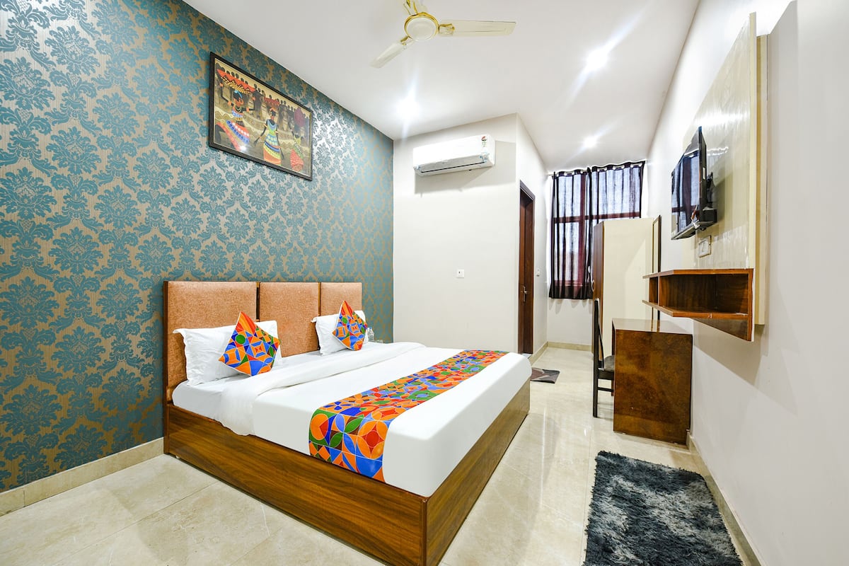 Deluxe kamer | Lakens van Egyptisch katoen, luxe beddengoed, een kluis op de kamer