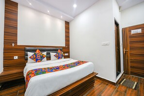 华丽客房 | 埃及棉床单、高档床上用品、客房内保险箱、免费 WiFi