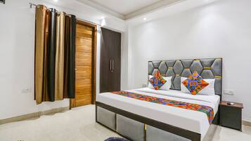 Habitación Deluxe | Sábanas de algodón egipcio, ropa de cama de alta calidad, caja fuerte