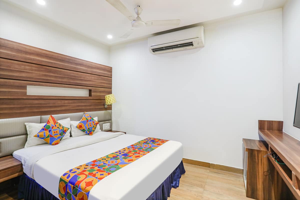 Premium kamer | Lakens van Egyptisch katoen, luxe beddengoed, een kluis op de kamer