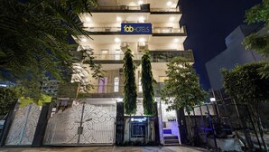 A multi-story building with a sign reading "fabHOTELS" at the top. - Fabhotel Interglobe Oasis (Gurugram)