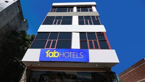 A building with a sign for 'fabHOTELS' and a banner advertising 'Hotel Galaxy.' - Fabexpress Galaxy (Kharar)