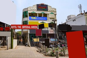 A hotel named "The Imperial Green" with a sign for "FabHotels" above it. - Fabhotel The Imperial Green (Nagpur)