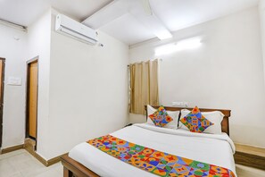 Deluxe kamer | Lakens van Egyptisch katoen, luxe beddengoed, een kluis op de kamer