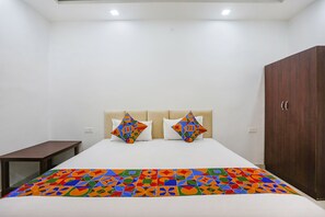 Egyptian cotton sheets, premium bedding, in-room safe, free WiFi - FabHotel JP Villa (Varanasi)