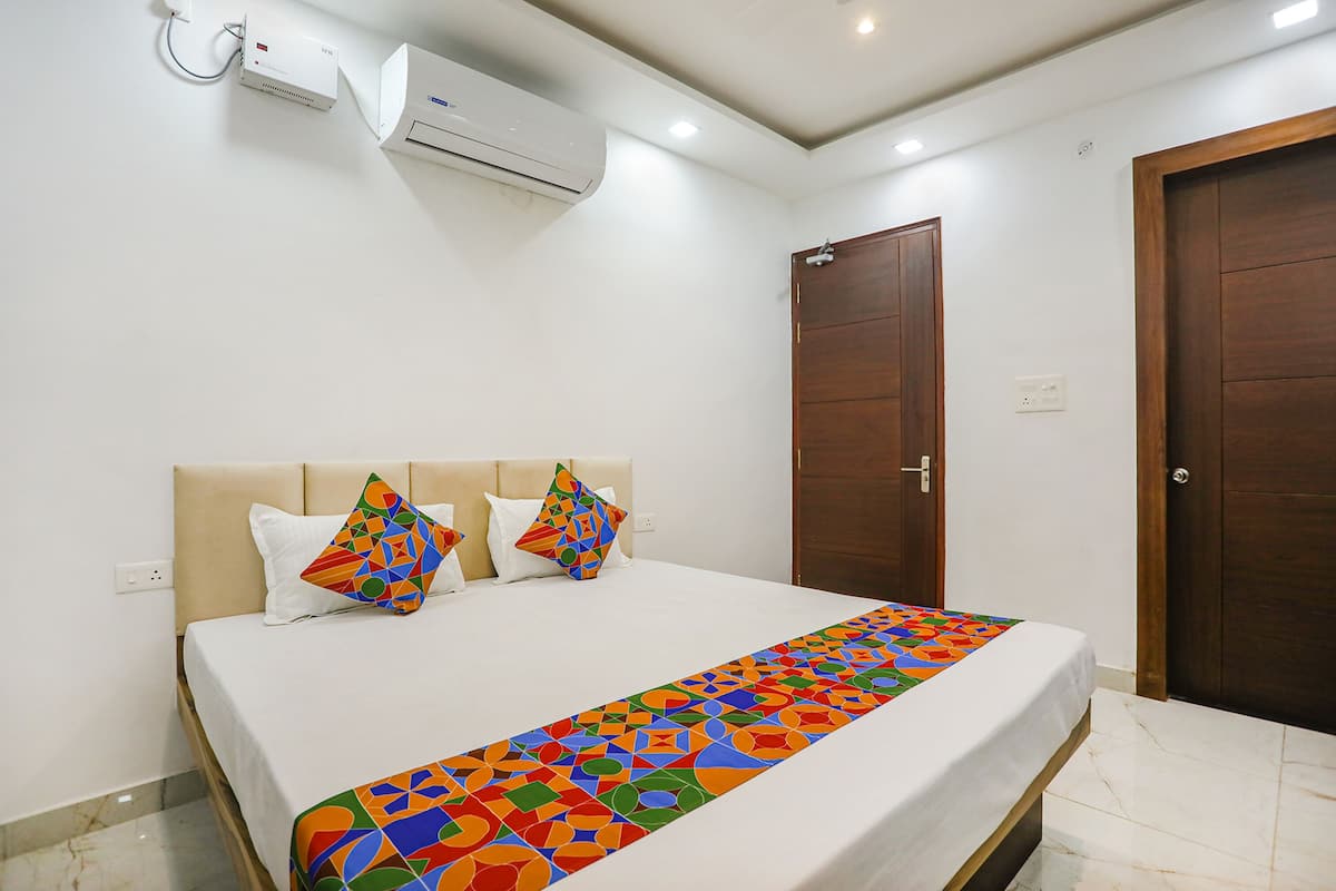 Habitación Deluxe | Sábanas de algodón egipcio, ropa de cama de alta calidad, caja fuerte