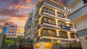 A multi-story hotel with a modern facade, balconies, and a sign for 'fabHOTELS'. - FabHotel Kohinoor Residency I (Pune)