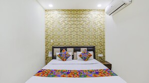 Habitación Deluxe | Sábanas de algodón egipcio, ropa de cama de alta calidad, caja fuerte