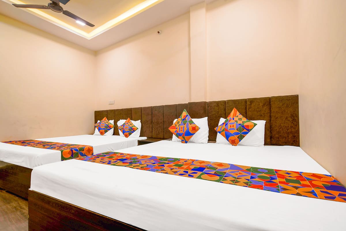 Habitación Deluxe | Sábanas de algodón egipcio, ropa de cama de alta calidad, caja fuerte