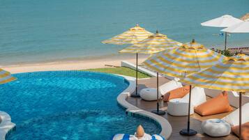 Outdoor pool, pool umbrellas, sun loungers