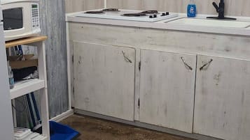 Microwave, stovetop, coffee/tea maker, toaster