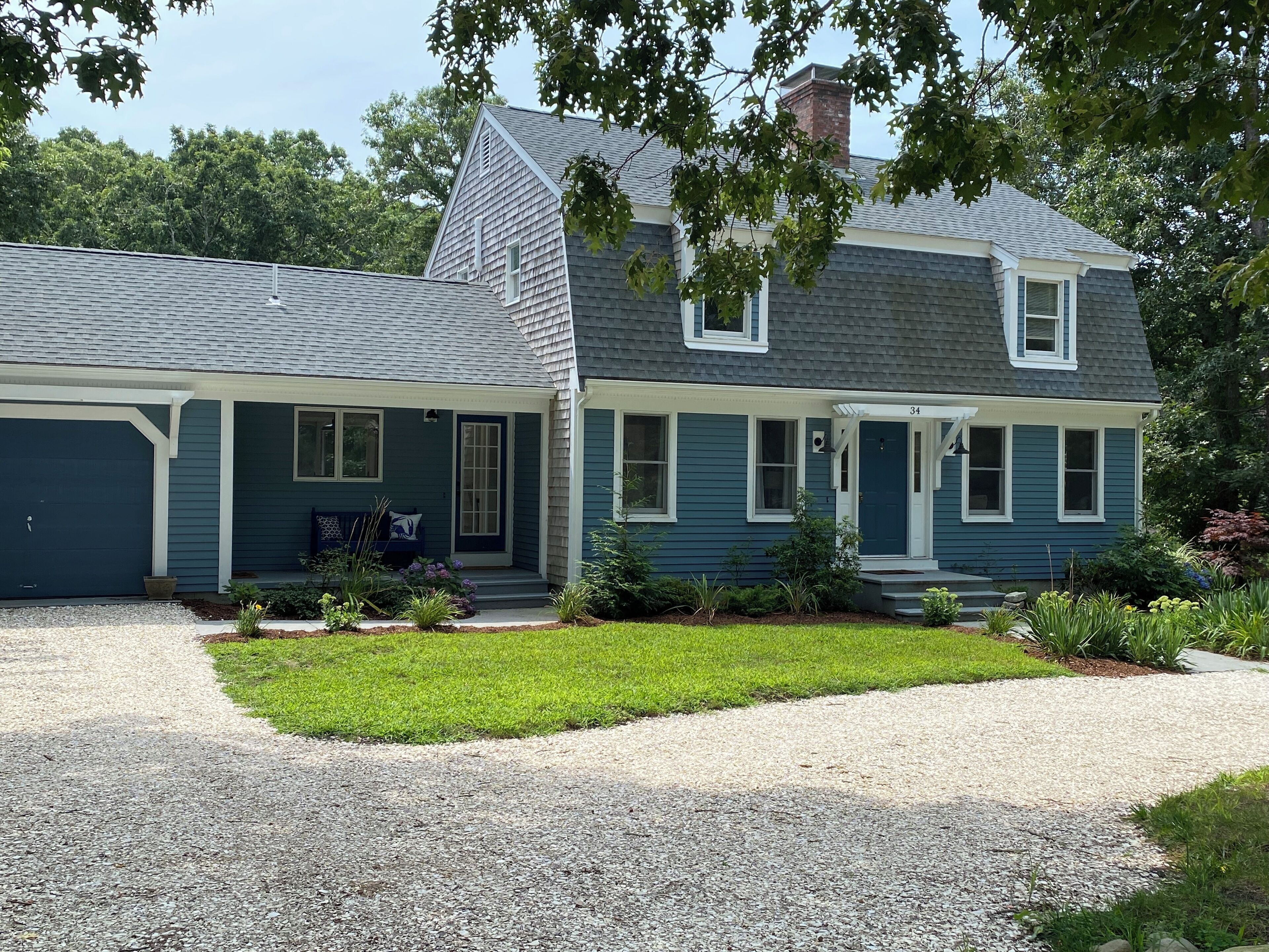 Newly listed for summer! Beautiful family home steps to largest lake on Cape Cod