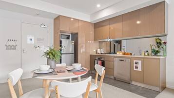 Fridge, microwave, toaster, cookware/dishes/utensils