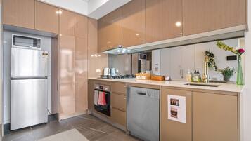 Fridge, microwave, toaster, cookware/dishes/utensils