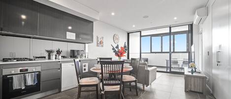 Fridge, electric kettle, toaster, cookware/dishes/utensils