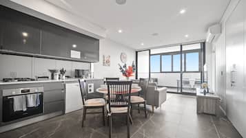 Fridge, electric kettle, toaster, cookware/dishes/utensils