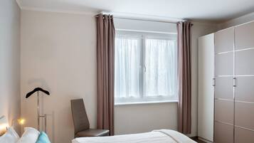 2 habitaciones, wifi gratis y ropa de cama