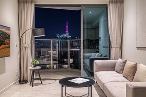 Signature Apartment, 2 Bedrooms, Balcony, Corner | Living area | 55-inch flat-screen TV with cable channels, Netflix, streaming services - The Metropole Opera Residence by Kaystay (Ho Chi Minh City)