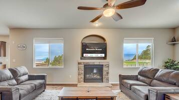 Télévision, cheminée, espaces bureaux