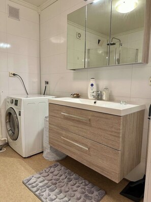 Shower, towels, soap, shampoo