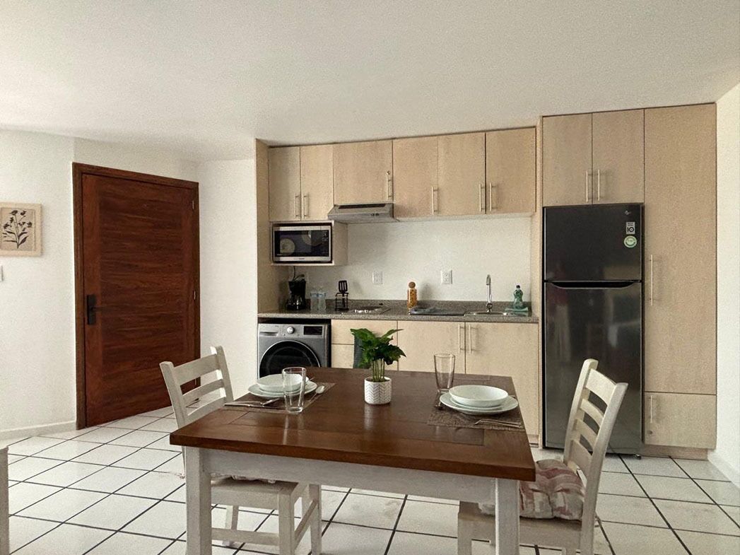 Deluxe Loft, Kitchen | Private kitchen | Full-size fridge, microwave, stovetop, coffee/tea maker
