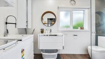 Hair dryer, towels, soap, shampoo