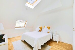 2 chambres, fer et planche à repasser, Wi-Fi, draps fournis