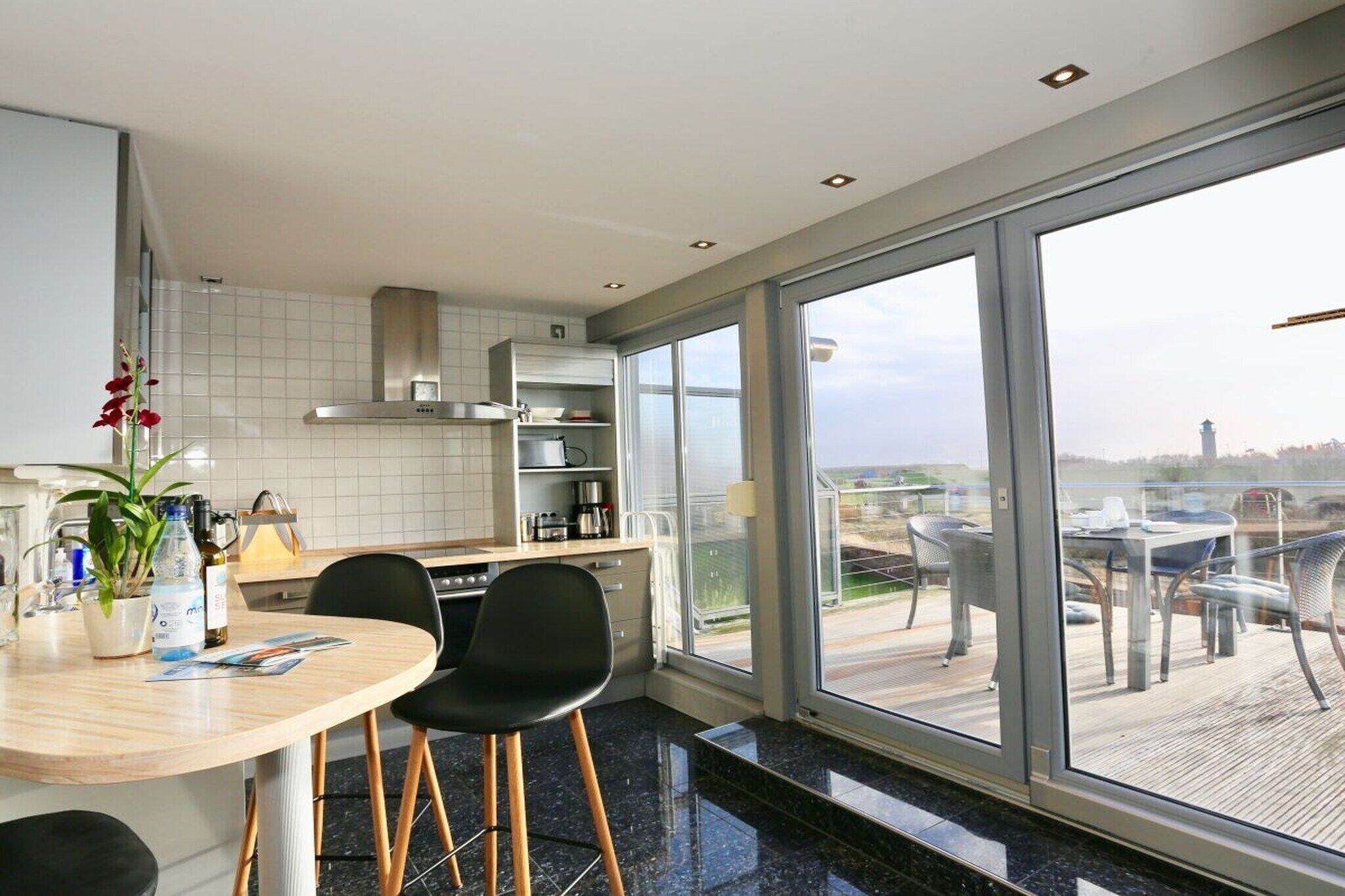 Fridge, stovetop, dishwasher, coffee/tea maker