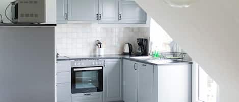 Fridge, microwave, high chair