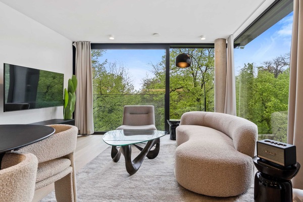 Lounge in style with panoramic views that bring the outdoors in.