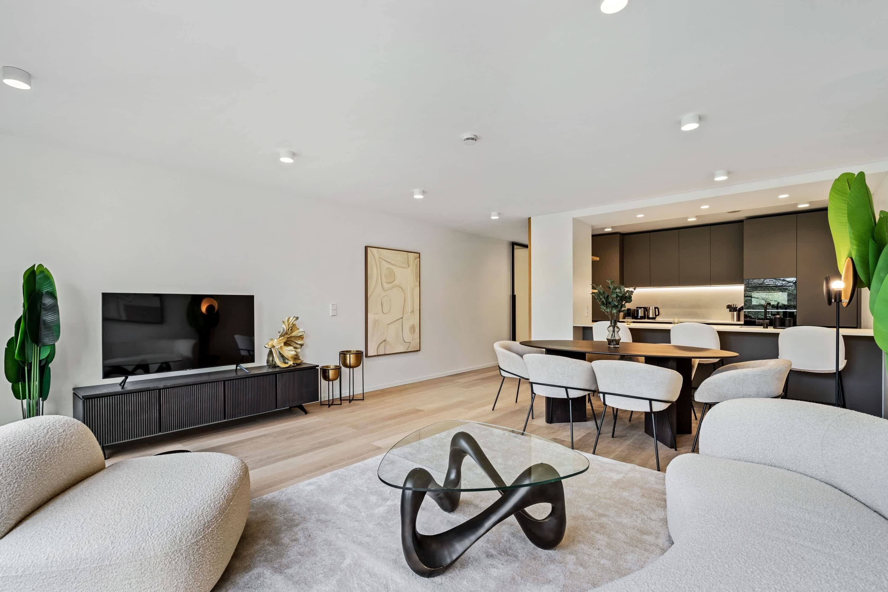 Chic minimalism shines in this well-appointed living space, welcoming you to unwind.