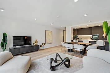 Chic minimalism shines in this well-appointed living space, welcoming you to unwind.