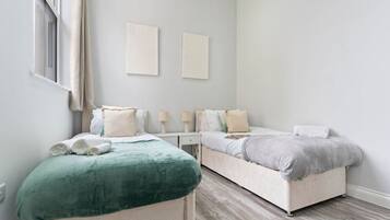 1 slaapkamer, een strijkplank/strijkijzer, gratis wifi, beddengoed