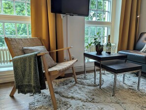 Standard Apartment | Living area | 32-inch TV with cable channels - Forenom Apartments Göteborg Geijersgatan (Gothenburg)