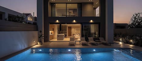 Outdoor pool, pool umbrellas, pool loungers