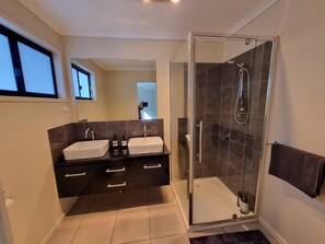 Shower, hair dryer, towels, soap