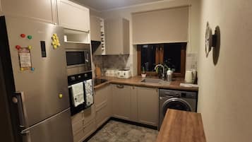 Apartment | Private kitchen | Fridge, microwave, oven, stovetop