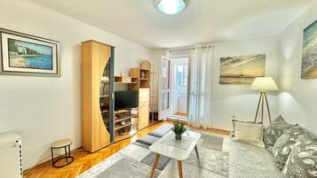 Comfort Apartment, Park View | Living area | 32-inch LCD TV with cable channels