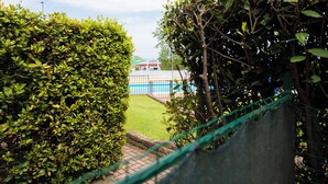 Căn hộ Club, quang cảnh vườn | Hiên