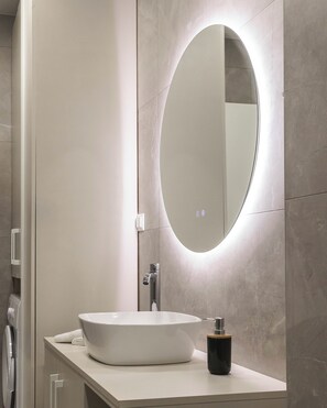 Hair dryer, towels, soap, toilet paper