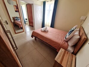 2 bedrooms, iron/ironing board, WiFi, bed sheets - Le Mirage Cozy Beach Apartment, 5 min walk to the beach. Enjoy sunset view (Flic en Flac)
