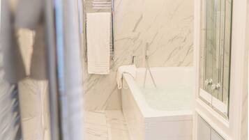 Deluxe Apartment, City View | Bathroom | Separate bathtub and shower, jetted bath, rainfall showerhead