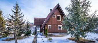 A cozy chalet with large backyard and a spaces for socializing