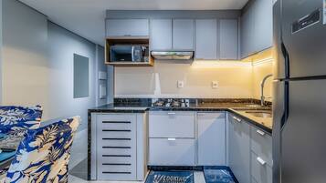 Apartment | Private kitchen | Fridge, coffee/tea maker, blender, cookware/dishes/utensils
