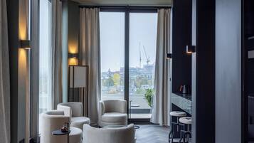 Deluxe Penthouse Apartment | Living area | 50-inch Smart TV with digital channels, Netflix, streaming services