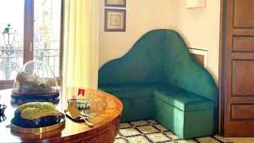 65-inch flat-screen TV with digital channels, pay films