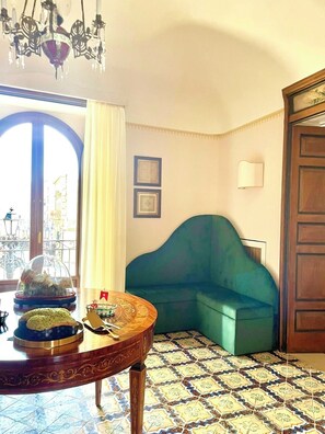 65-inch flat-screen TV with digital channels, pay films