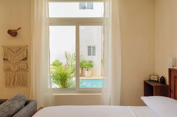 1 bedroom, desk, iron/ironing board, travel cot